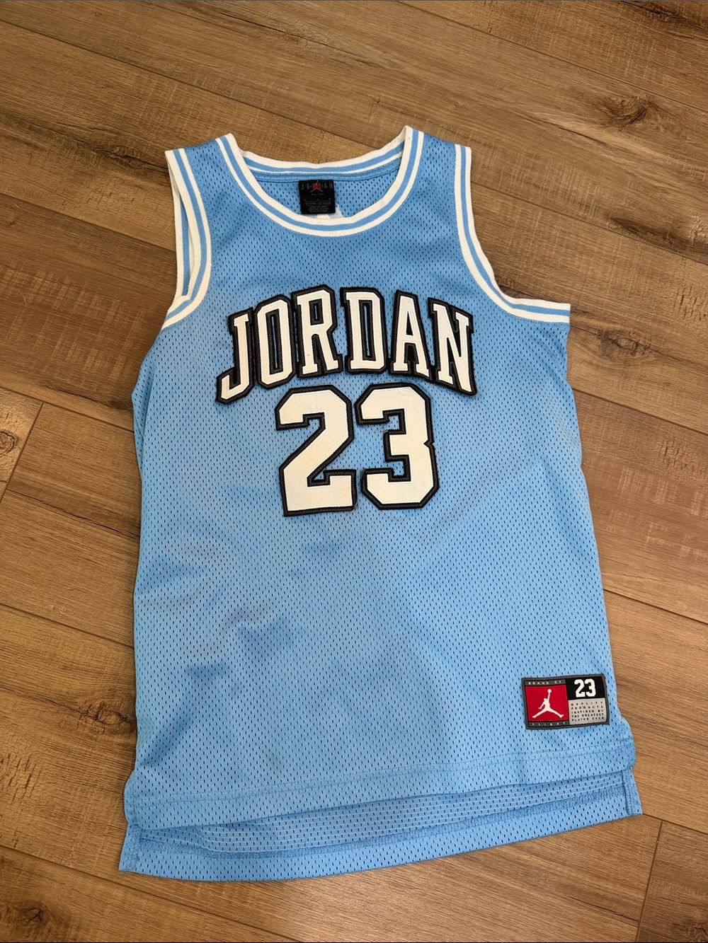 Jordan Light Blue Mesh Basketball Jersey with White & Black Accents